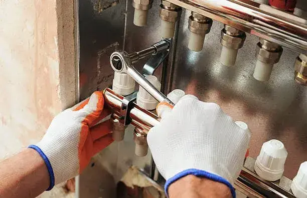NexAir Home Services technician checking a newly installed tankless system in St. Albans, WV. Tankless Water Heater Installation Near Me.