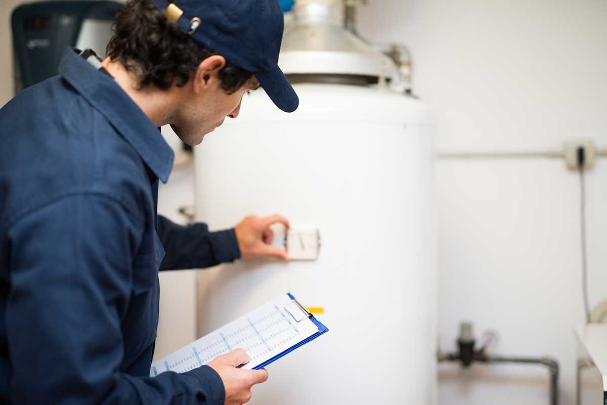 Furnace repair technician working on system in Huntington, WV